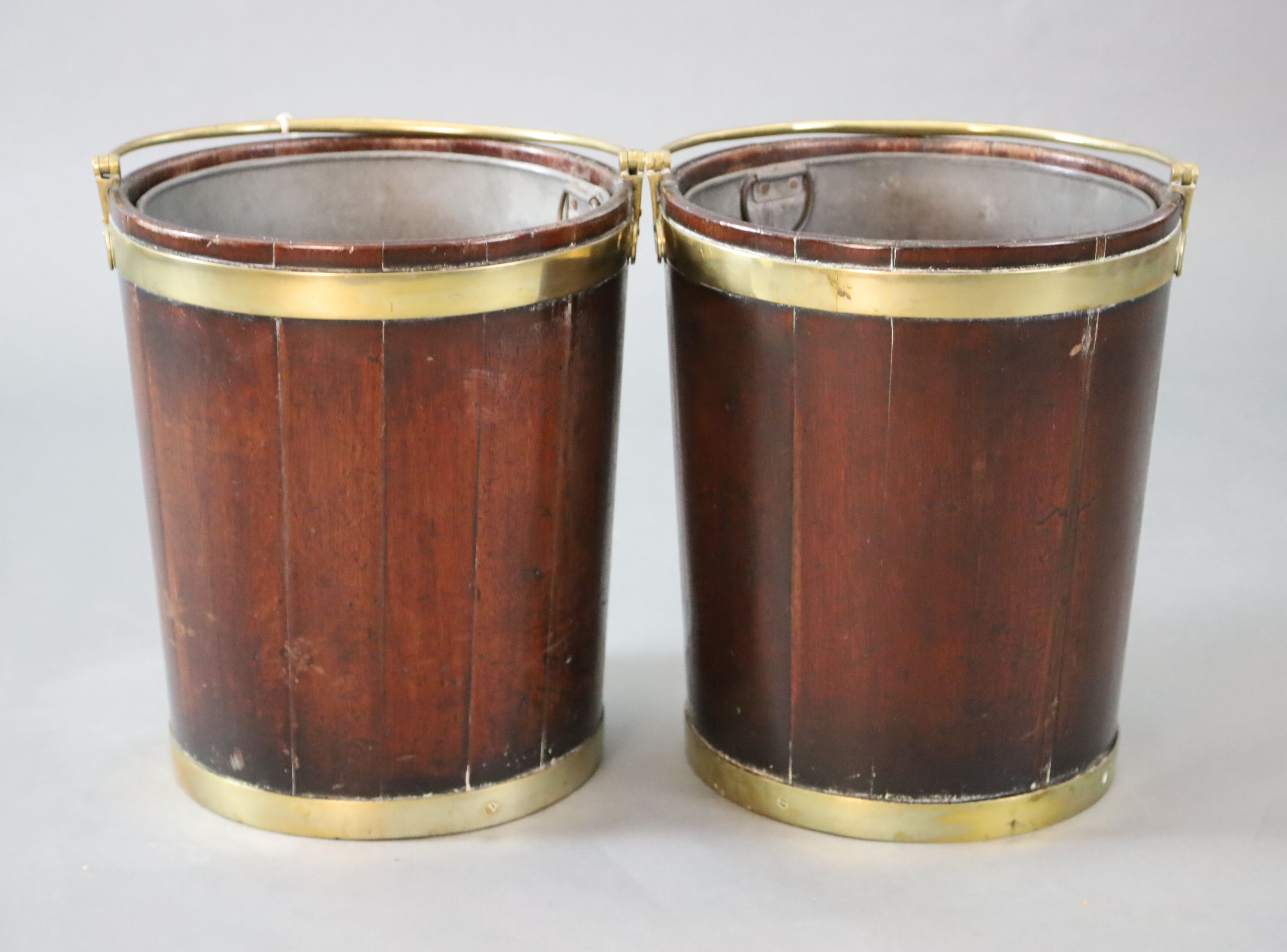 A pair of George III brass bound mahogany peat buckets, W.1ft 3in. H.1ft 5in.